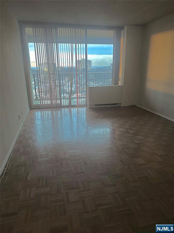 6 Horizon Road, Unit 1204 Fort Lee, NJ 07024 - Photo 18 of 19 en empty room with windows