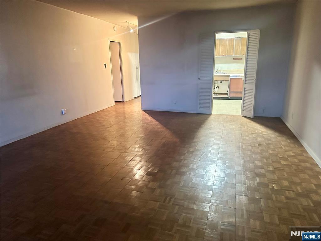 6 Horizon Road, Unit 1204 Fort Lee, NJ 07024 - Photo 8 of 19 a view of a livingroom with wooden floor