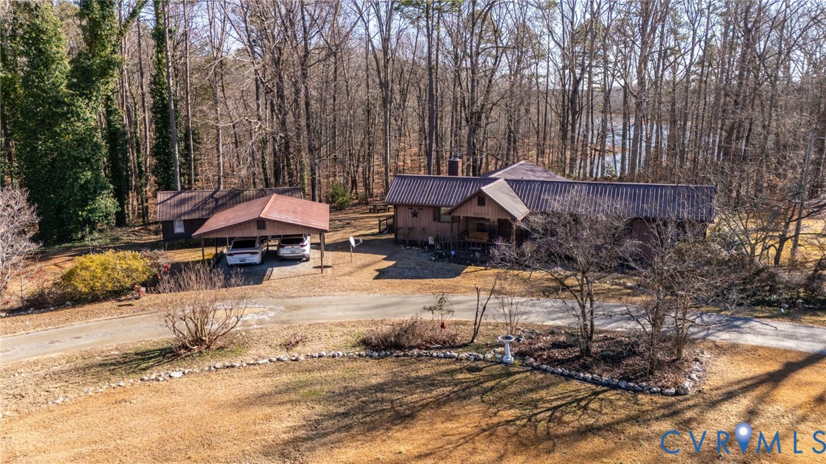 475 Dove Road Boydton, VA 23917 - Photo 32 of 45 a backyard of a house with barbeque oven