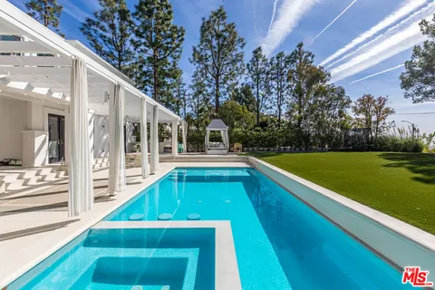 a view of a house with a big yard