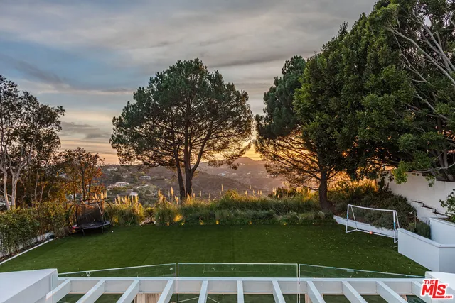 a bathroom with a bathtub and sink