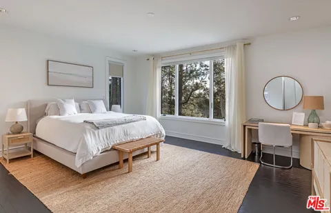 a bathroom with a bathtub and a sink