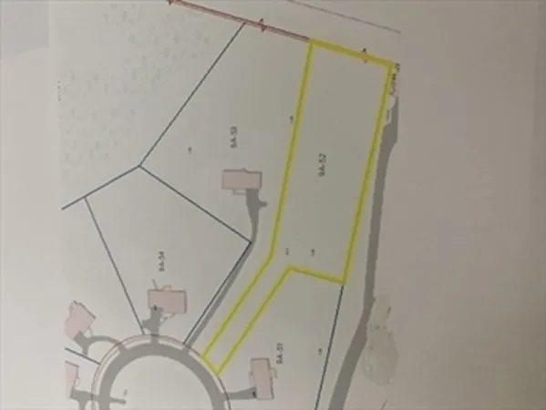 a view of a street with cars