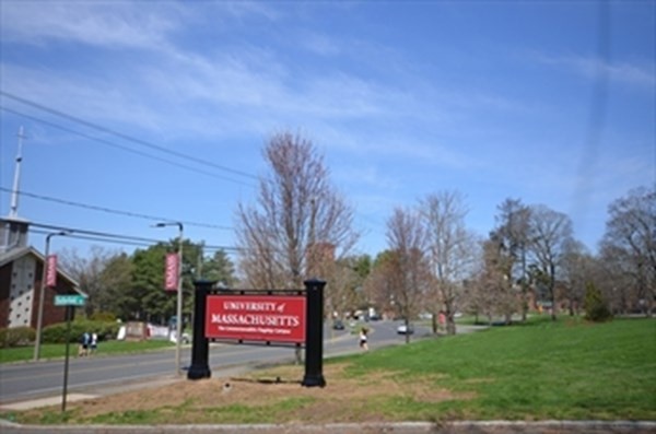 185 Cherry Lane Amherst, MA 01002 - Photo 5 of 6 a sign on the side of the road