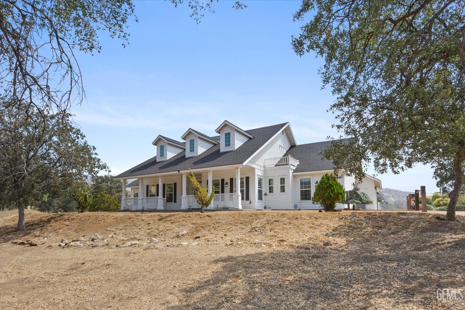 Undisclosed Address Caliente, CA 93518 - Photo 12 of 73 a front view of a house with a yard