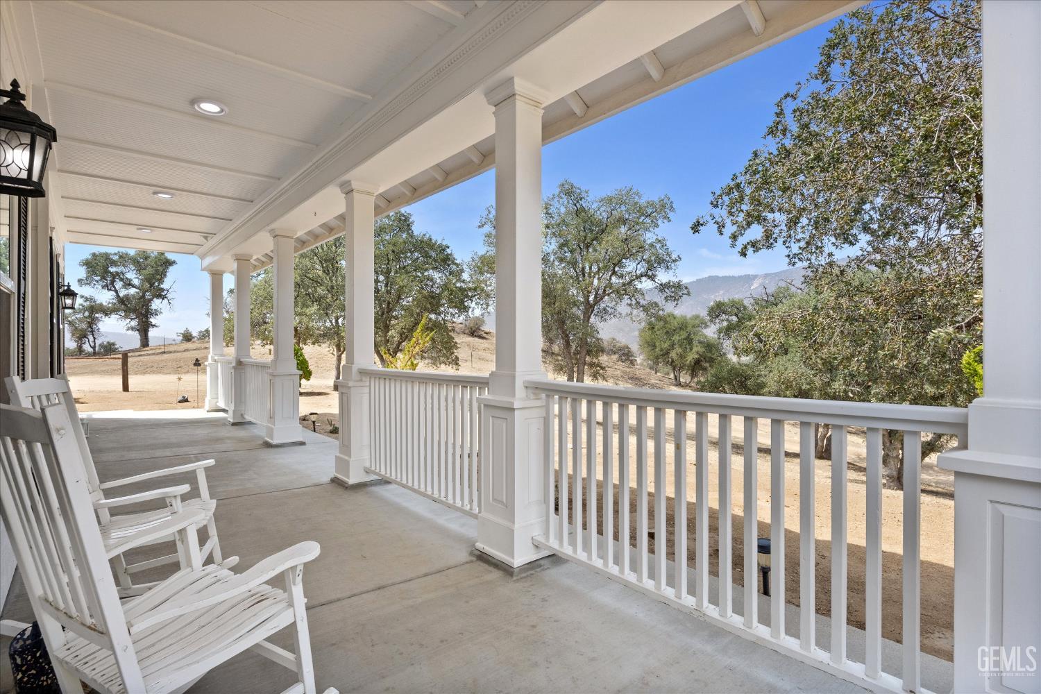 Undisclosed Address Caliente, CA 93518 - Photo 14 of 73 a view of a chair and tables in the balcony