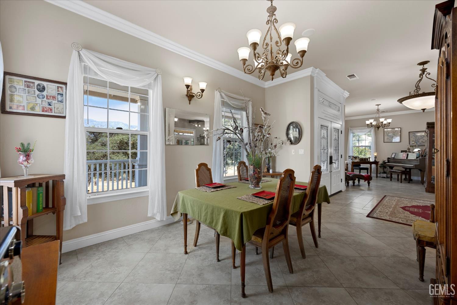 Undisclosed Address Caliente, CA 93518 - Photo 21 of 73 a view of a dining room with furniture and a chandelier