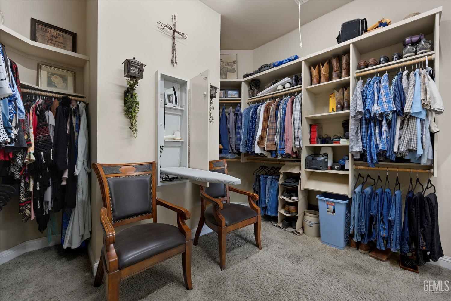 Undisclosed Address Caliente, CA 93518 - Photo 51 of 73 a view of walk in closet with clothes and shoes