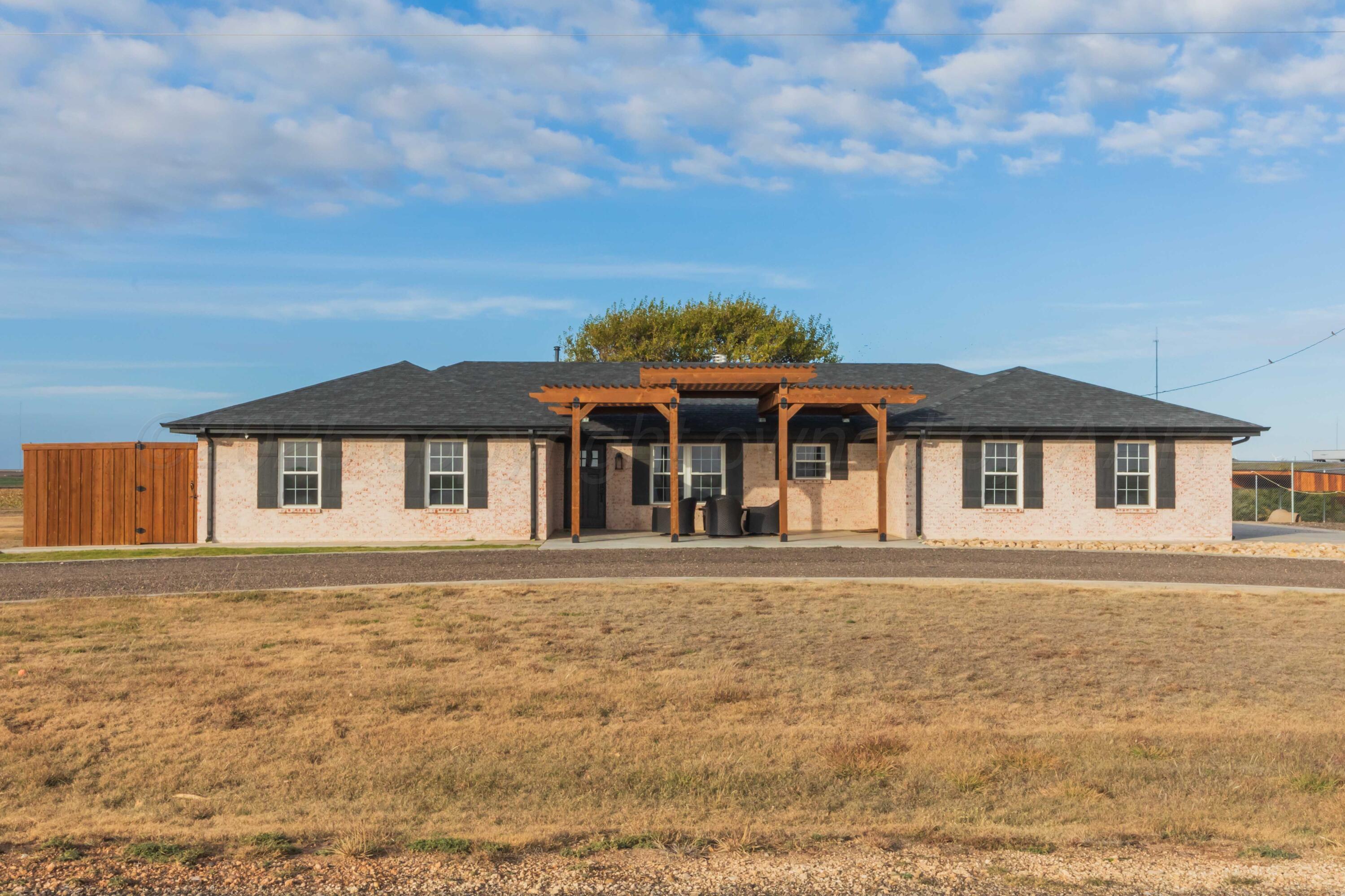 199 County Road BB Groom, TX 79039 - Photo 1 of 39 front view of house with a yard