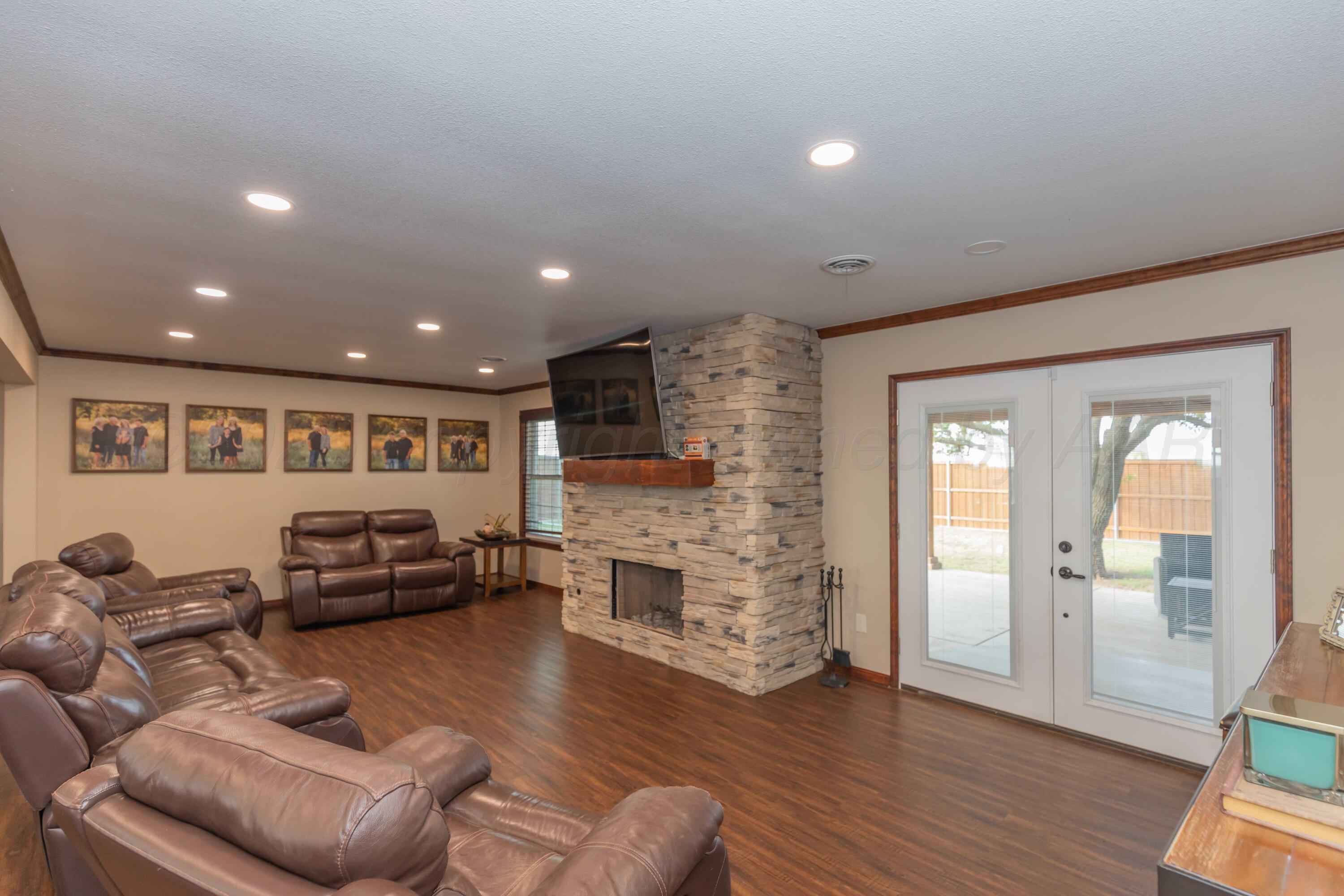 199 County Road BB Groom, TX 79039 - Photo 16 of 39 a living room with furniture and a fireplace