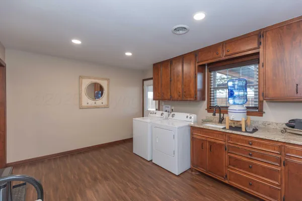 a front view of house with yard and seating area