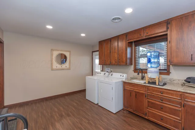 a front view of house with yard and seating area