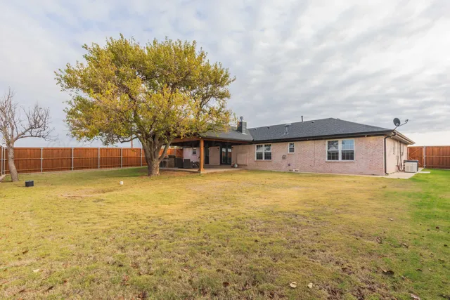 a view of outdoor space and yard