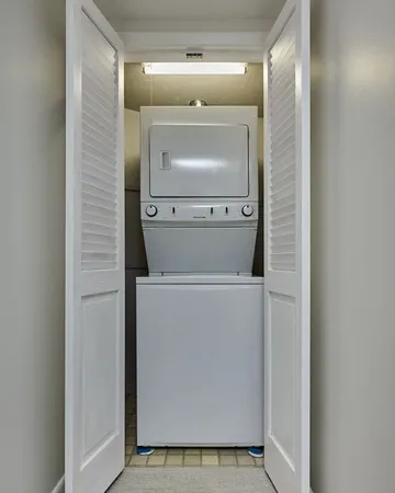 a utility room with washer and dryer