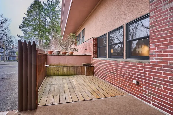a view of outdoor space with deck and furniture