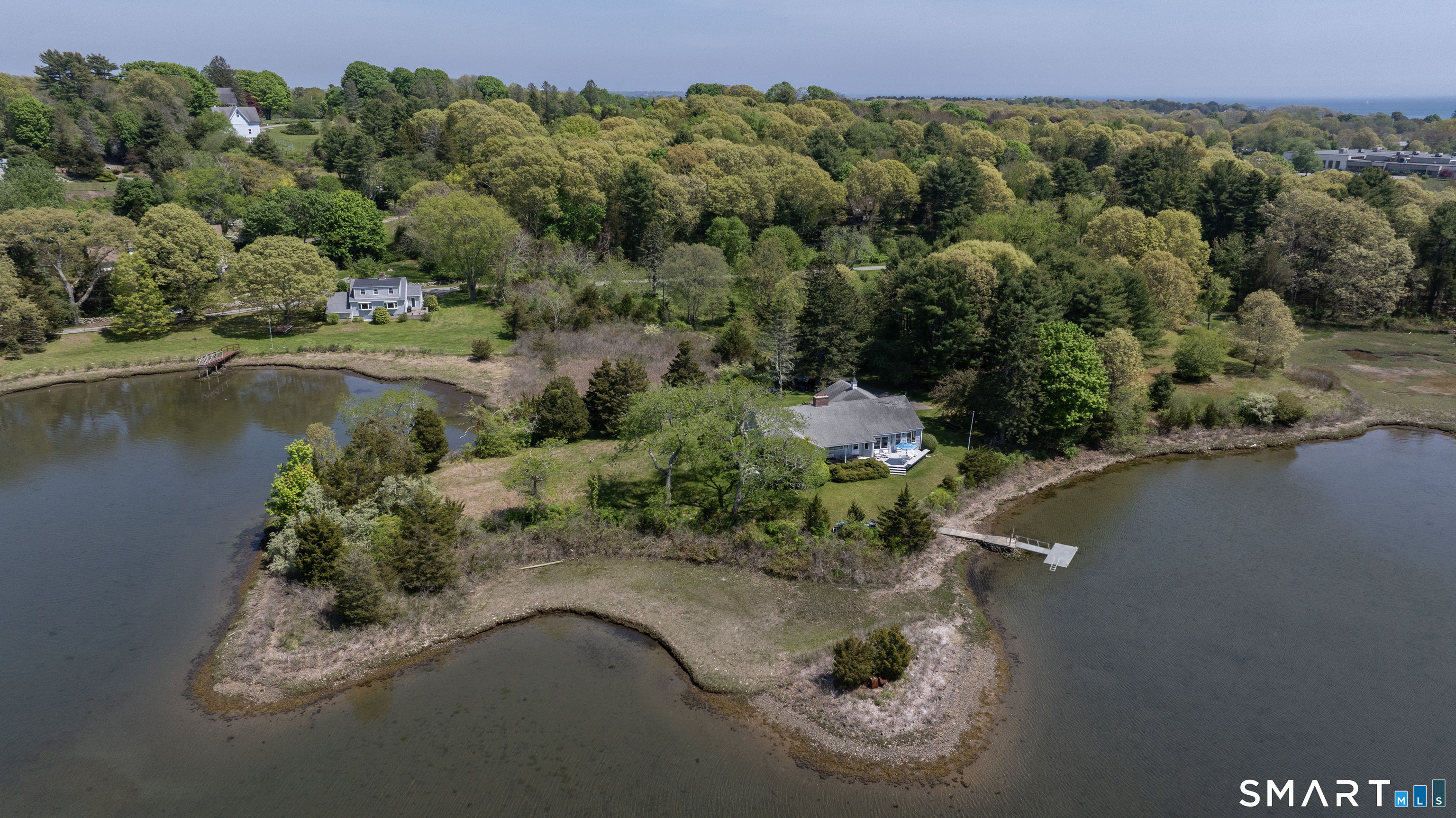 27 Wilbur Road Stonington, CT 06378 - Photo 35 of 40 an aerial view of a house with a yard and lake view