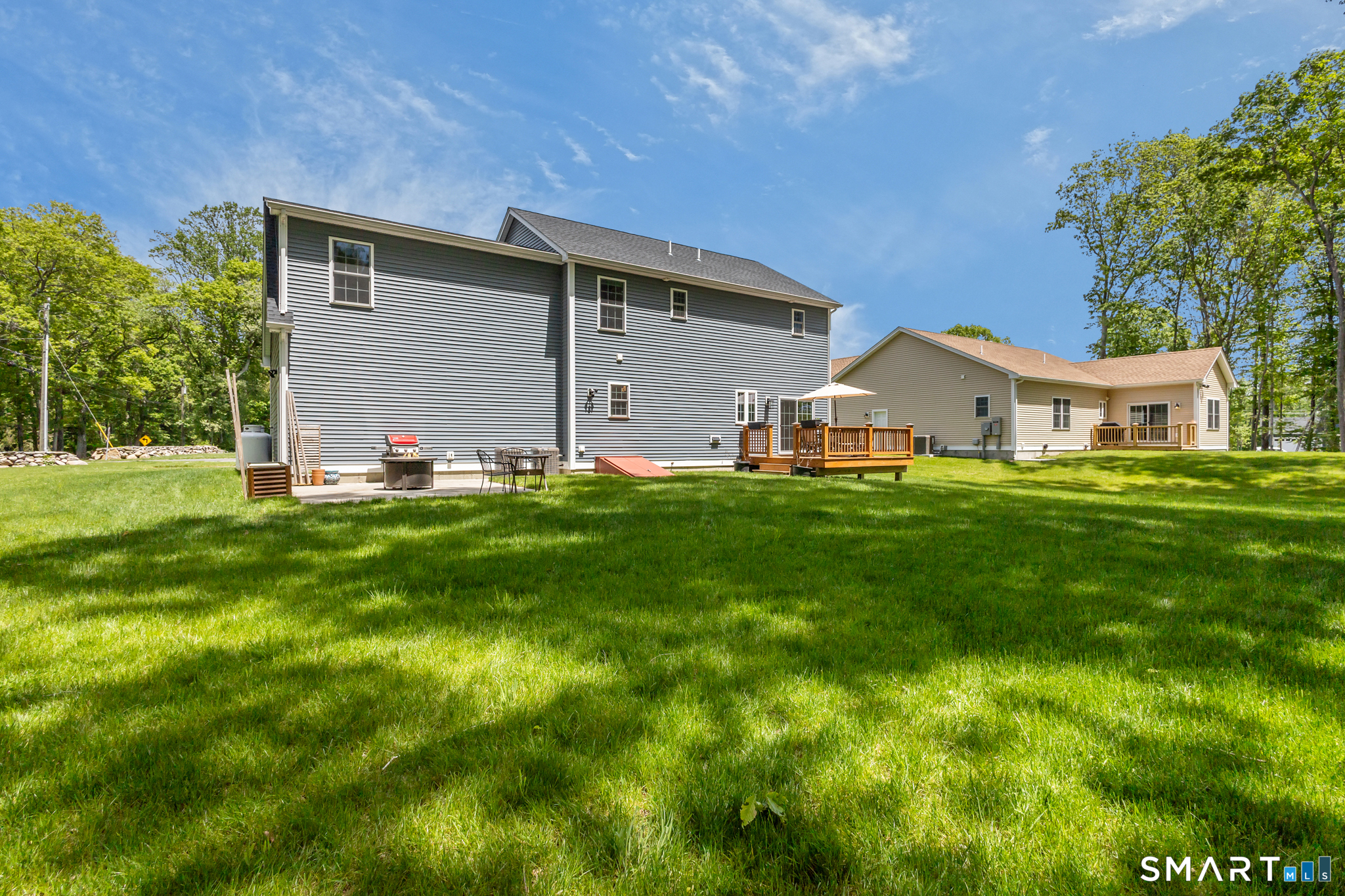 2 Martys Way Gales Ferry, CT 06335 - Photo 35 of 40 a front view of house with yard and green space