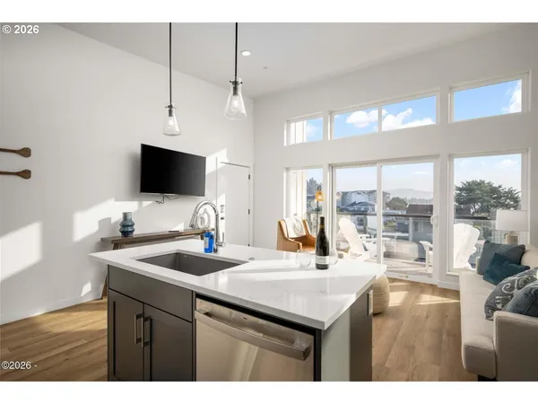a kitchen with a sink and a microwave