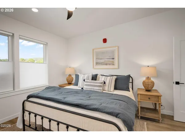 a bedroom with a bed and dresser