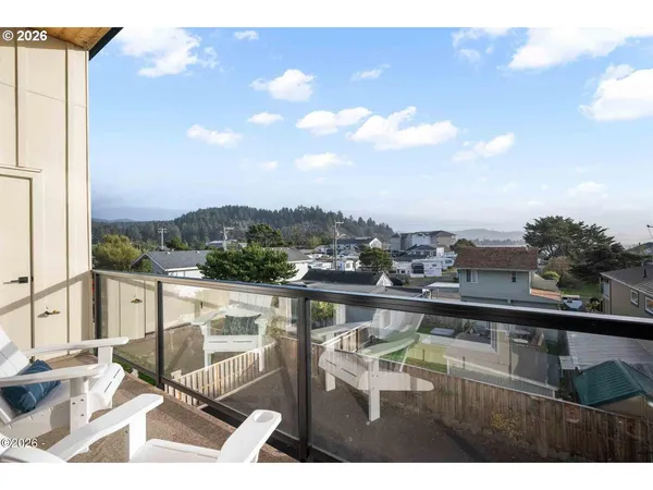 a view of swimming pool from a balcony