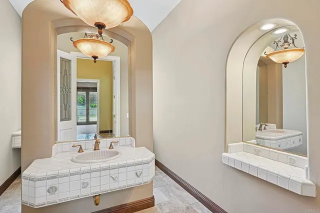 a view of living room with granite countertop furniture and a fireplace