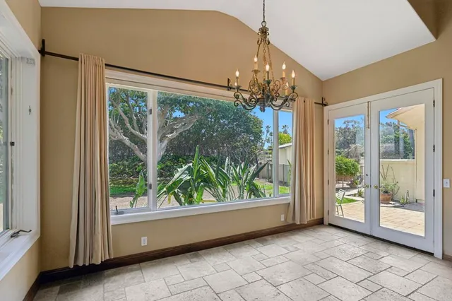 a view of a kitchen with a sink and a cabinet
