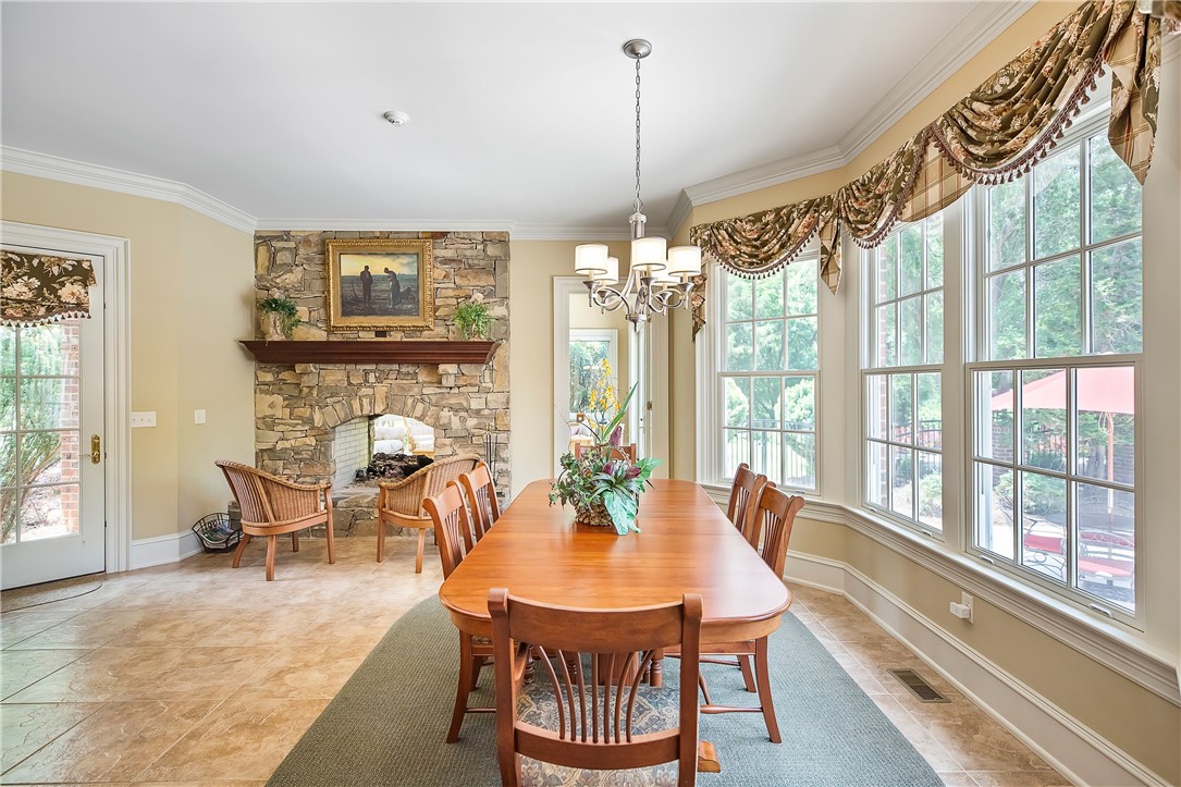 1617 Hook Road Honea Path, SC 29654 - Photo 22 of 50 Breakfast Area and Fireplace Sitting Area