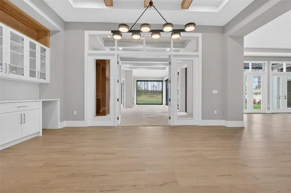 a view of an empty room and window