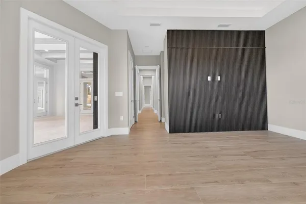 a view of empty room with windows