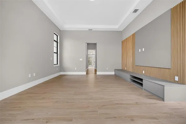 a view of a livingroom with furniture and a garage
