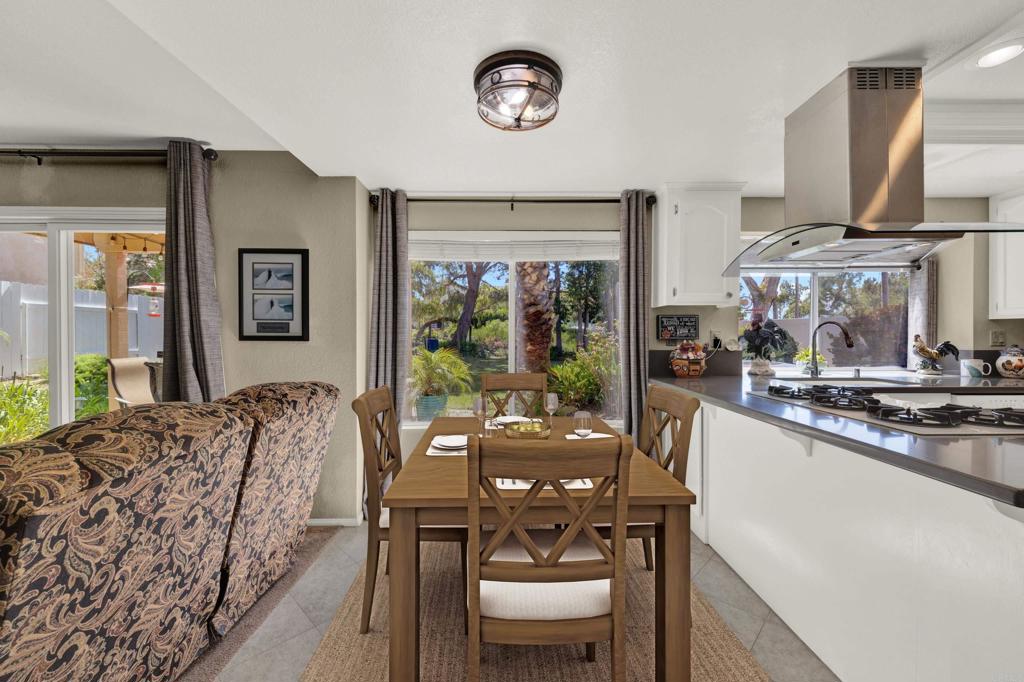 3761 Hillview Way Oceanside, CA 92056 - Photo 14 of 75 a view of a dining room with furniture window and outside view