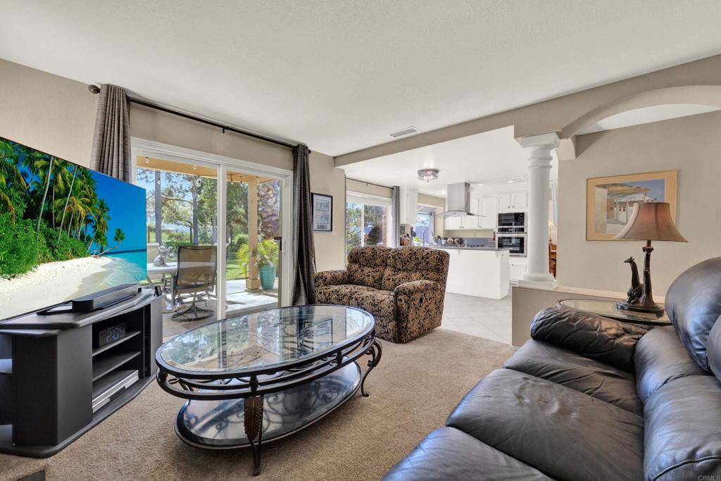 3761 Hillview Way Oceanside, CA 92056 - Photo 27 of 75 a living room with furniture and a fireplace