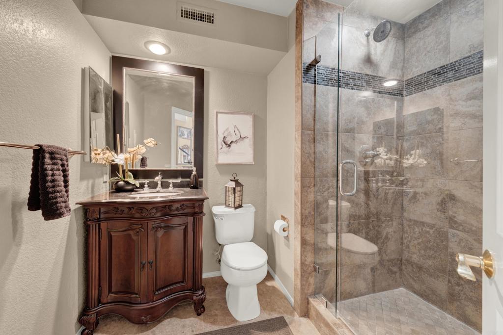 3761 Hillview Way Oceanside, CA 92056 - Photo 33 of 75 a bathroom with a toilet sink and shower