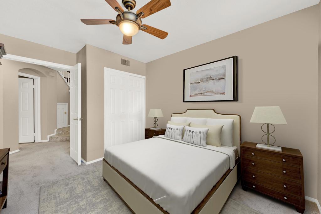 3761 Hillview Way Oceanside, CA 92056 - Photo 35 of 75 a bedroom with a bed and a painting on the wall