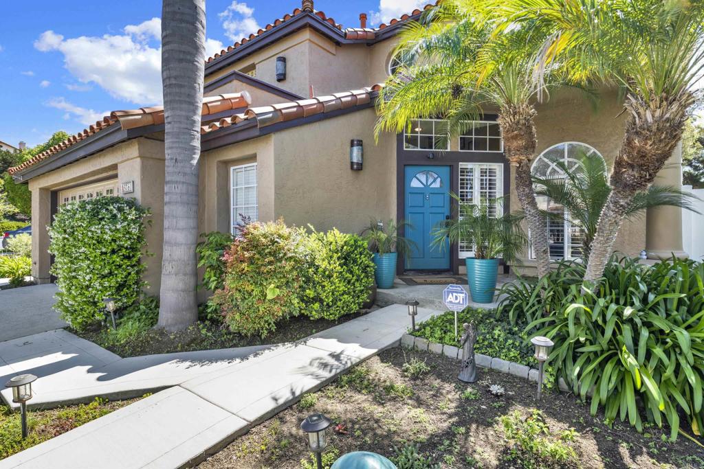3761 Hillview Way Oceanside, CA 92056 - Photo 4 of 75 a front view of a house with garden
