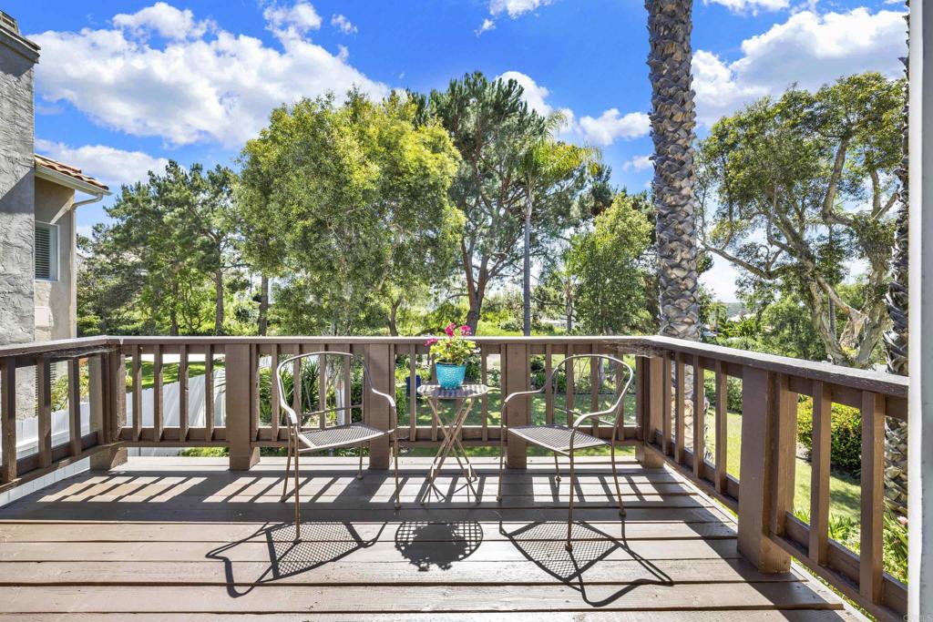 3761 Hillview Way Oceanside, CA 92056 - Photo 50 of 75 a view of a balcony with chairs and wooden floor