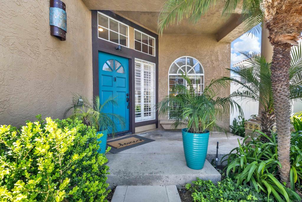 3761 Hillview Way Oceanside, CA 92056 - Photo 5 of 75 a vase of flowers sitting on a floor