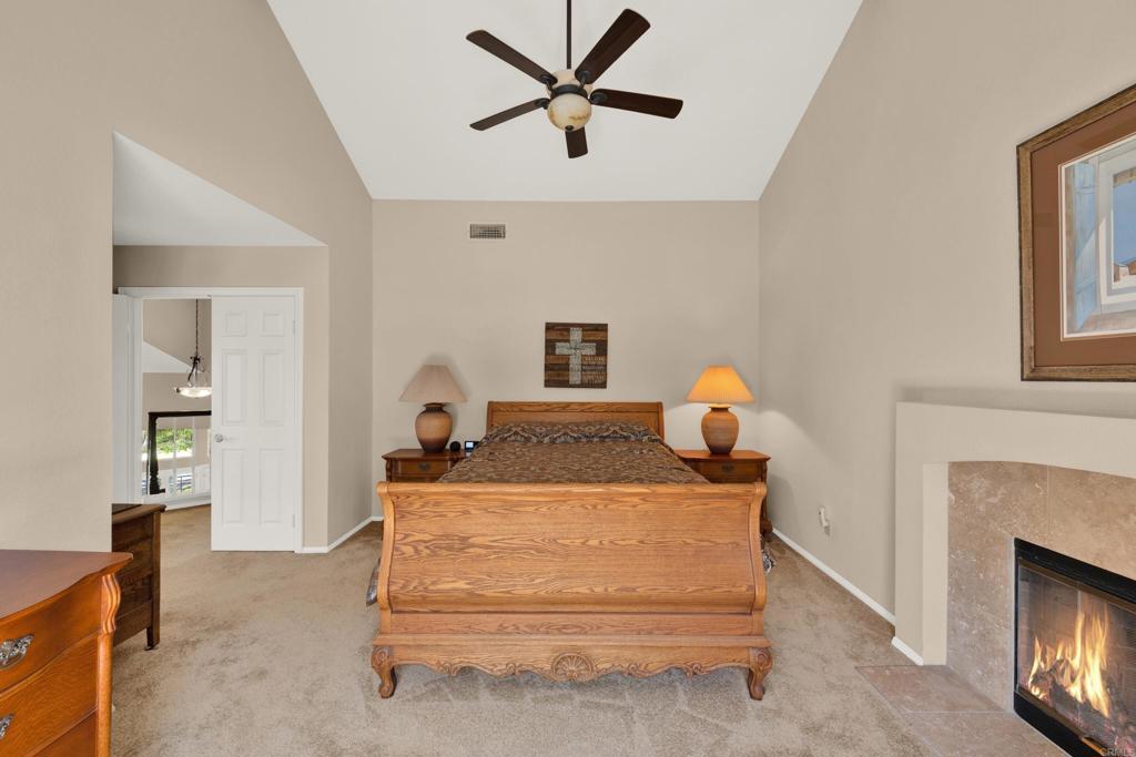 3761 Hillview Way Oceanside, CA 92056 - Photo 52 of 75 a living room with furniture and a fireplace