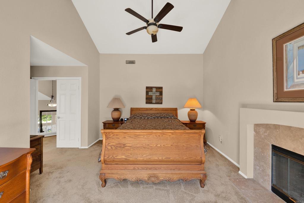 3761 Hillview Way Oceanside, CA 92056 - Photo 53 of 75 a living room with furniture and a fireplace