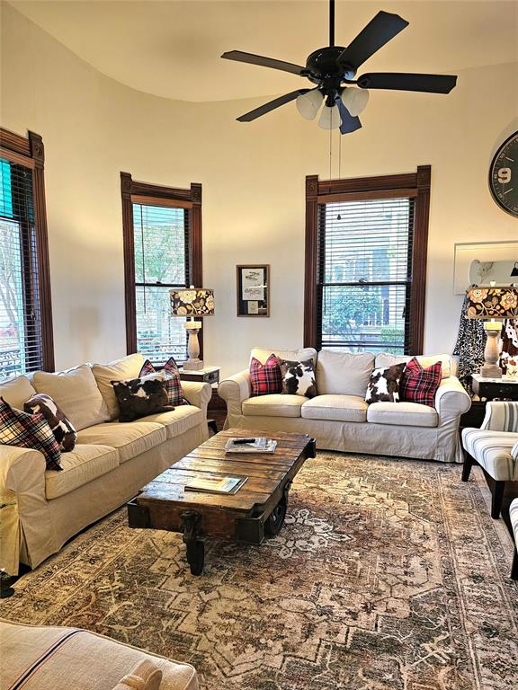 1111 West Main Street Denison, TX 75020 - Photo 5 of 36 Great living area with original stained glass, curved walls and wavy glass windows