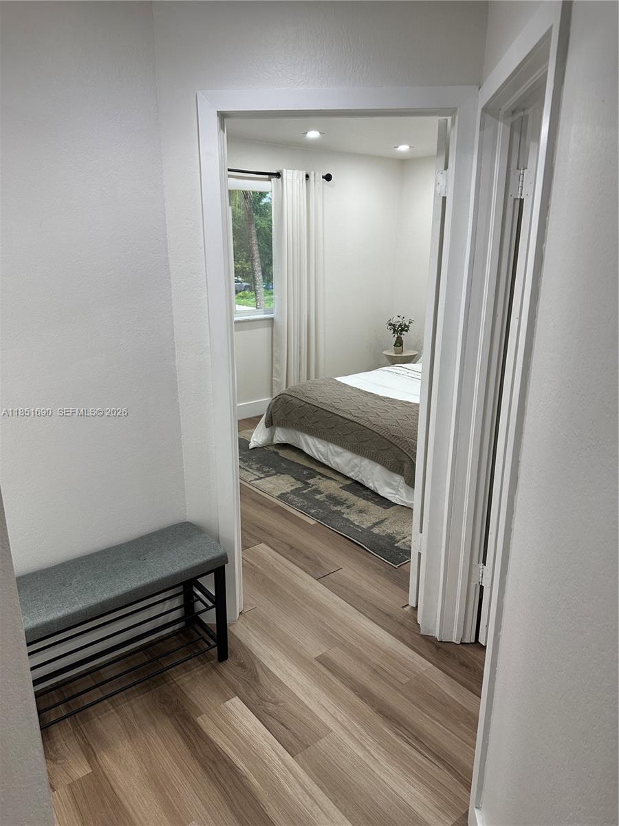 11 Northeast 151st Street Miami, FL 33162 - Photo 65 of 95 a bathroom with a sink and a mirror