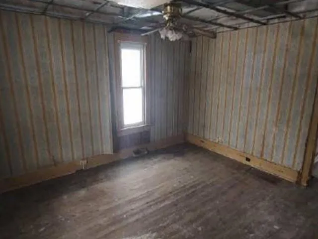 an empty room with windows