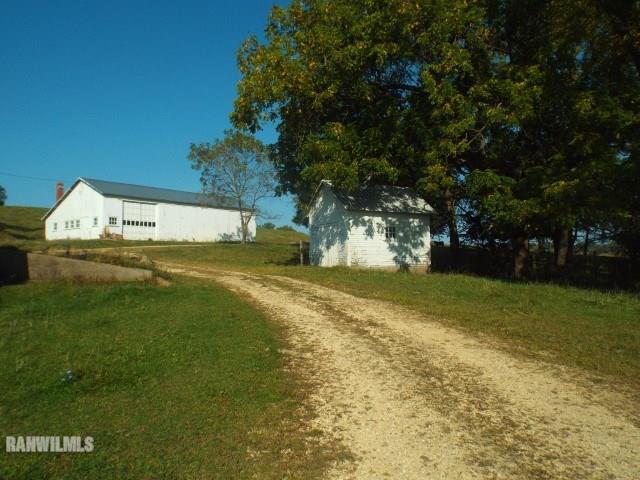 10905 South Massbach Road Elizabeth, IL 61028 - Photo 23 of 41 a view of a field with trees