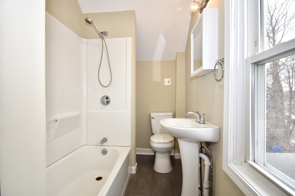 253 Adams Street Fairhaven, MA 02719 - Photo 14 of 17 a bathroom with a sink toilet and shower