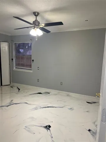 a view of a room with a fan