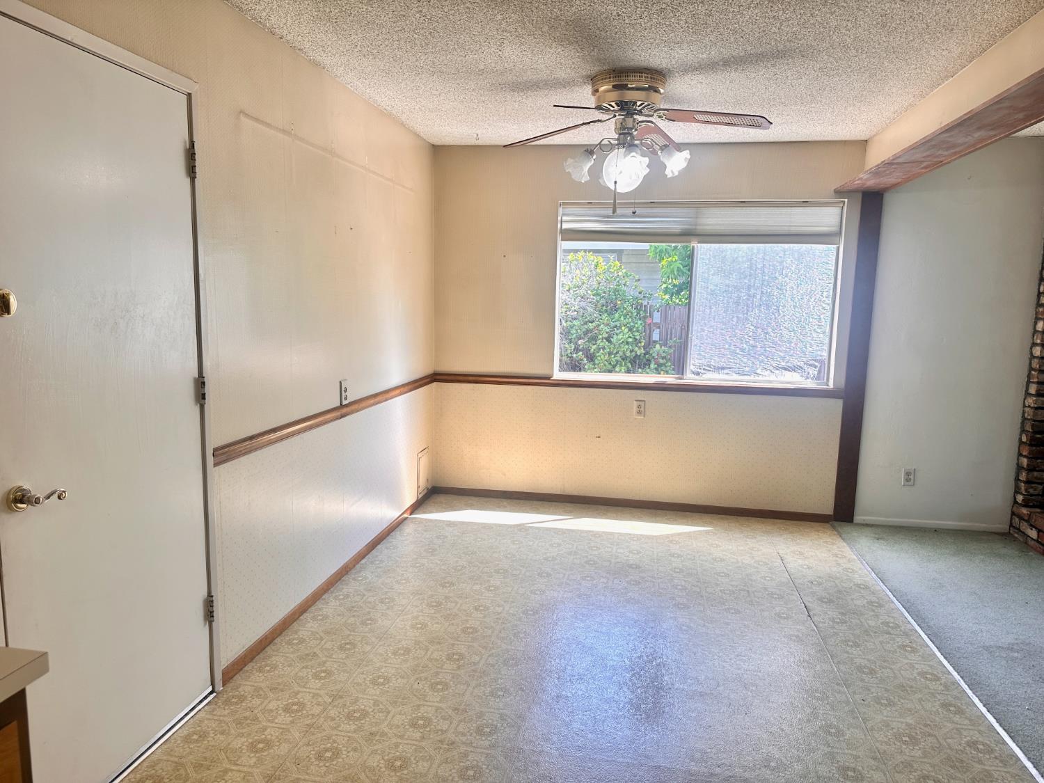 3207 Terry Way Carmichael, CA 95608 - Photo 7 of 36 a view of an empty room with a window