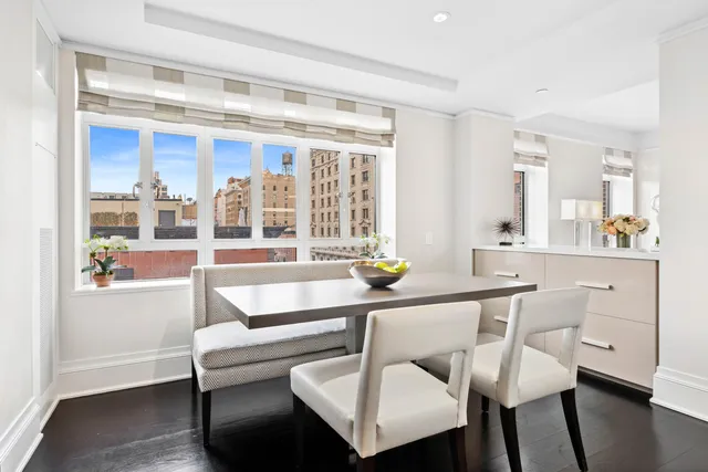 a large kitchen with stainless steel appliances lots of counter space and a sink