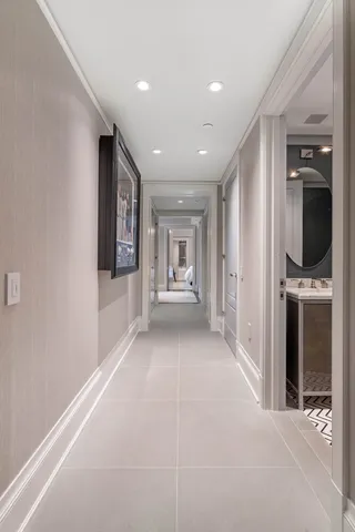 a view of a living room and a balcony