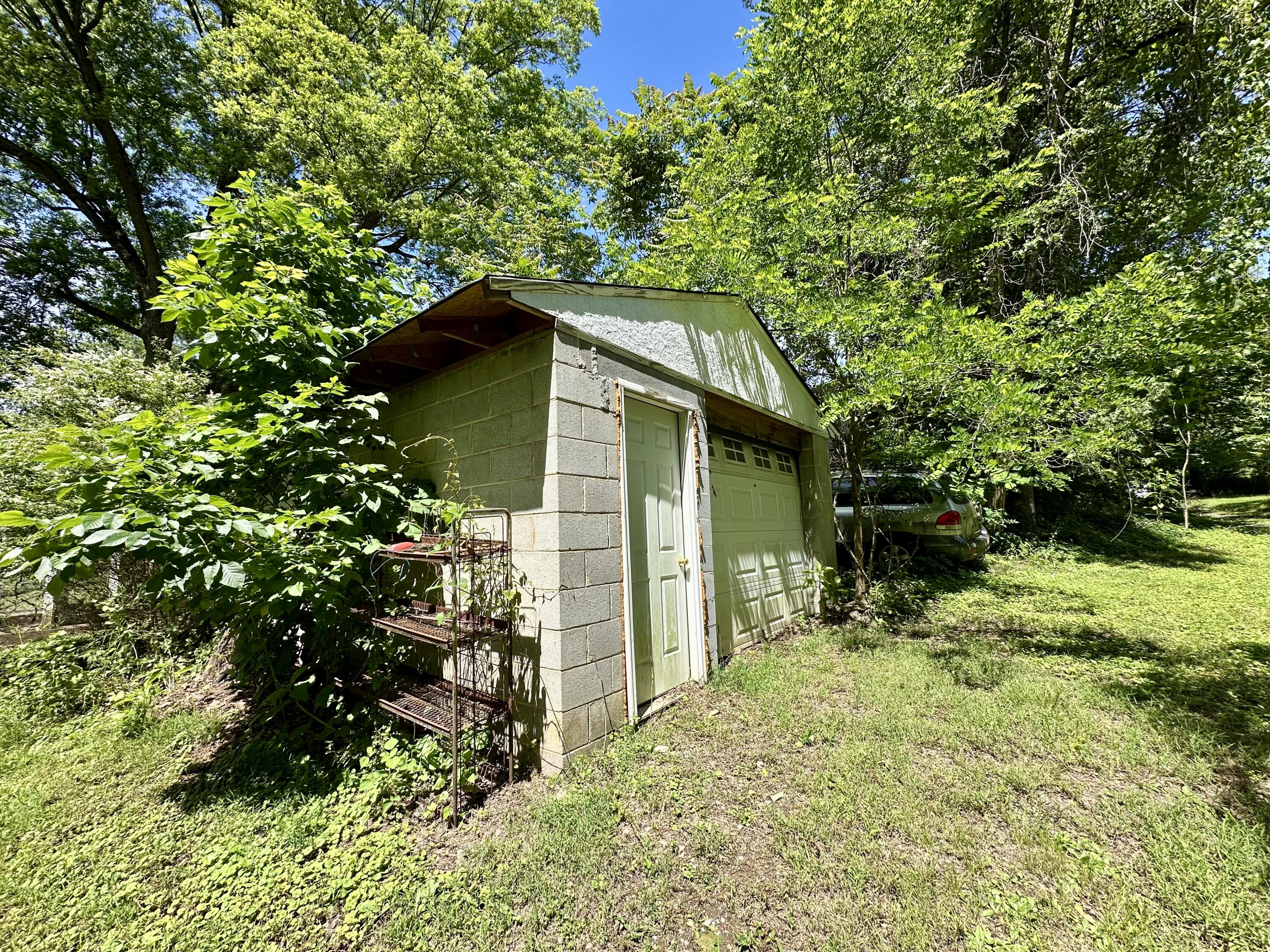 1074 Lynn Lane Blue Ridge, VA 24064 - Photo 3 of 6 a backyard of a house with lots of green space