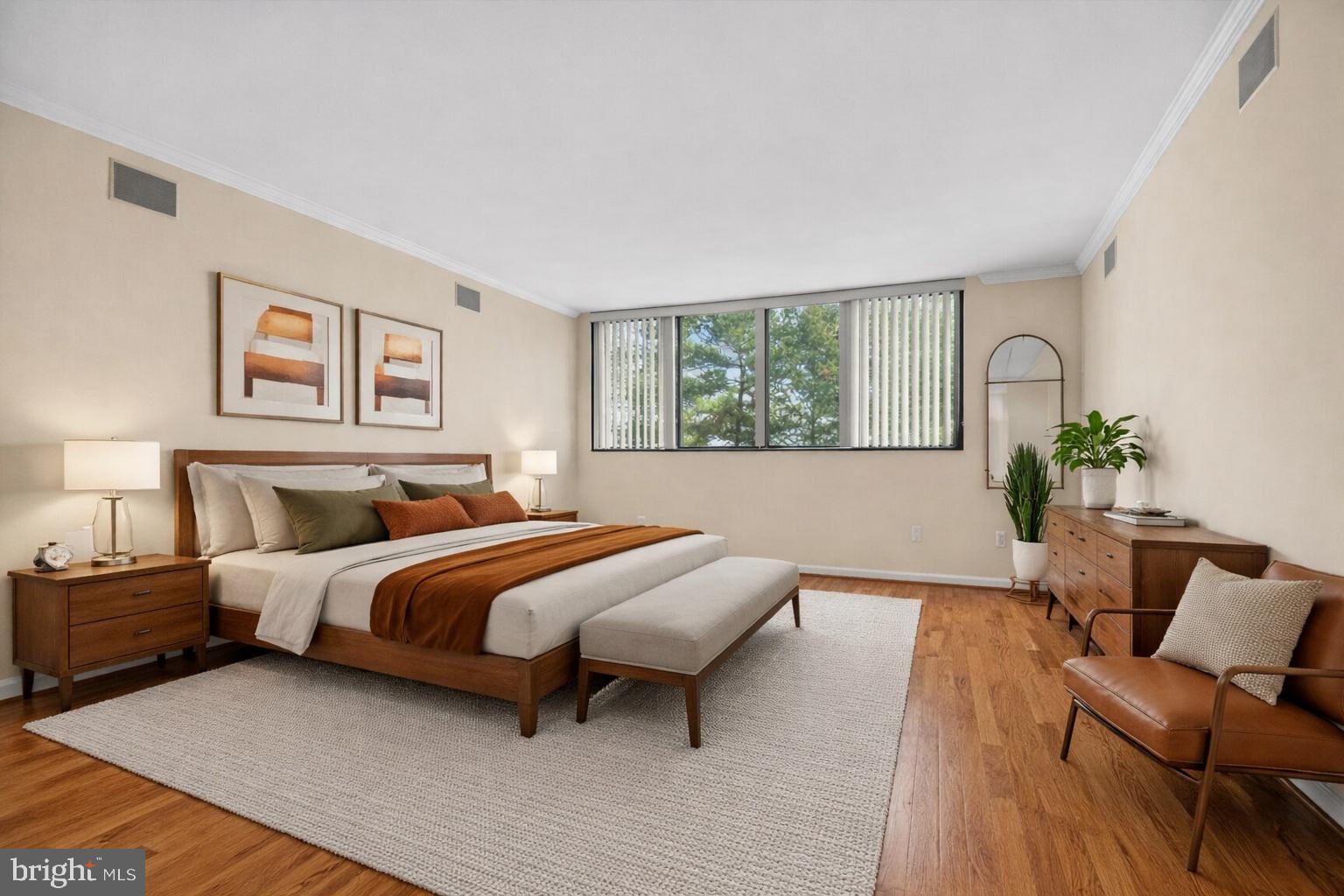 1101 South Arlington Ridge Road, Unit 504 Arlington, VA 22202 - Photo 15 of 37 a bedroom with a bed and a couch